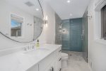 King Master suite bathroom with walk in tiled shower
